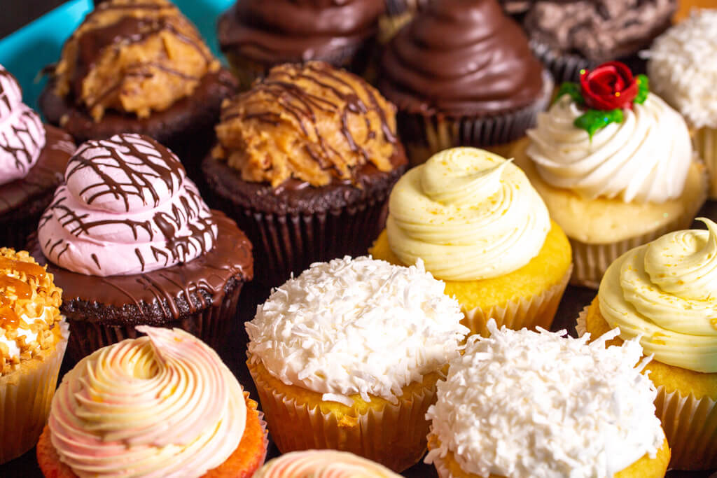 Different kinds of cupcakes with decorative frosting